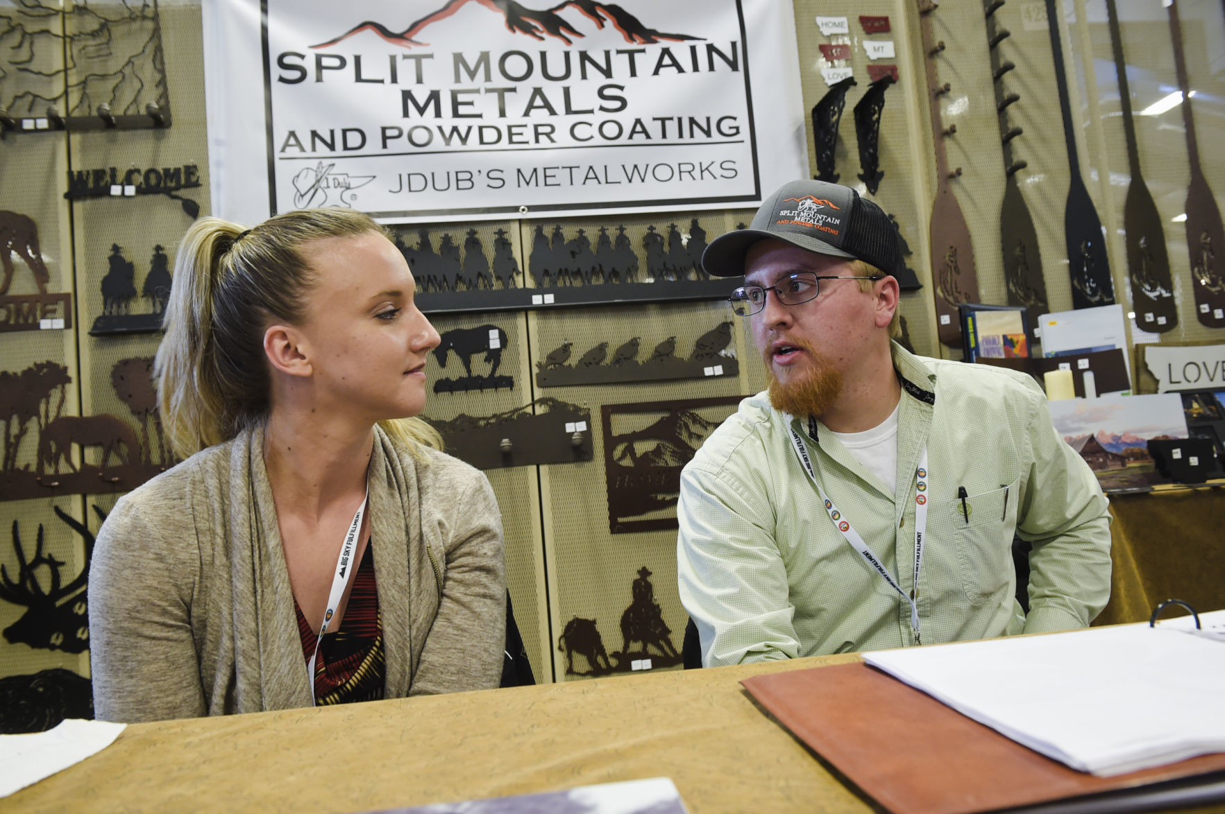 Brad Brenteson, right, looks to his wife, Carley, during a recent interview